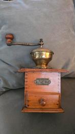 Antieke koffiemolen, Ophalen