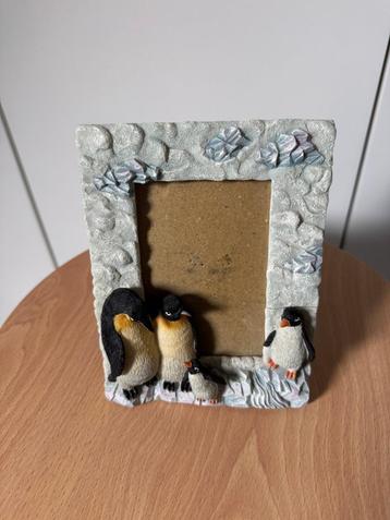 fotolijst met pinguïns beschikbaar voor biedingen