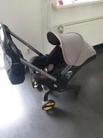 Doona autostoel en kinderwagen in één met regenhoes, Doona EU, Doona, Duowagen, Zo goed als nieuw