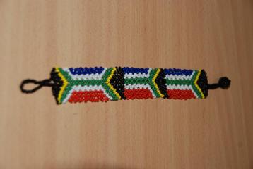 Armbandje of enkelbandje van kralen.  beschikbaar voor biedingen