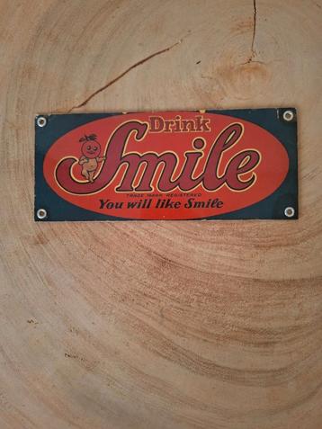 Oude metalen reclameplaat Smile drink  beschikbaar voor biedingen