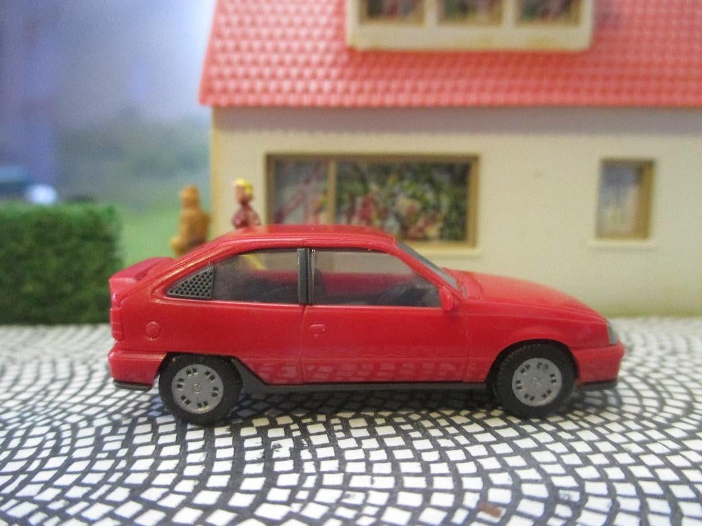 Opel Kadett E Gsi - Herpa rood, Hobby en Vrije tijd, Ophalen of Verzenden, Zo goed als nieuw, Auto, Herpa