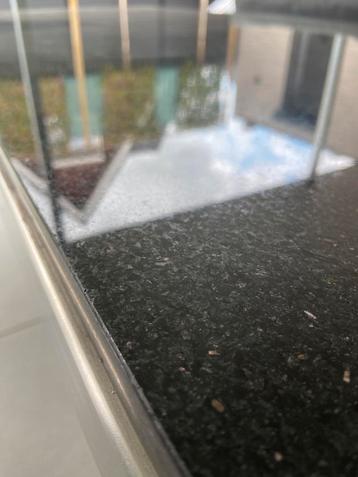 Stijlvolle granieten eettafel met RVS onderstel! beschikbaar voor biedingen