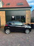 Ford Ka 1.2 51KW 2010 Zwart Titanium, Auto's, Voorwielaandrijving, Stof, 4 stoelen, Zwart