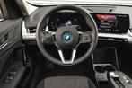 BMW iX1 eDrive20 / Parking Assistant / DAB / Trekhaak / Driv, Auto's, BMW, Stof, Zwart, Nieuw, Parkeercamera