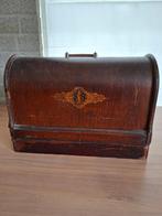 antieke Singer naaimachine, Ophalen