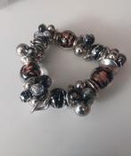 Zilverkleurige armband met bruin en zwart, Overige materialen, Verzenden, Zo goed als nieuw, Met bedels of kralen