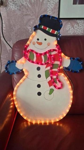 Sneeuwpop met gekleurde lampje,s beschikbaar voor biedingen