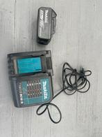 Makita Accu 18V 5.0Ah + Oplader DC18SD, Ophalen of Verzenden, Gebruikt
