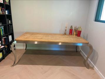 Luxe design tafel: echt houten blad met RVS sierpoten beschikbaar voor biedingen
