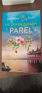 Parel van de Zeven Zussen - Lucinda Riley, Boeken, Ophalen of Verzenden, Zo goed als nieuw, Lucinda Riley, Nederland