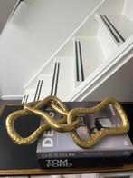 Ornament Schakel Goudkleur, Huis en Inrichting, Woonaccessoires | Overige, Ophalen of Verzenden, Nieuw