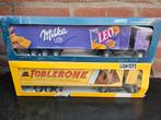Lion Toys Milka en Toblerone vrachtwagen (met doos), Hobby en Vrije tijd, Modelauto's | 1:50, Ophalen of Verzenden, Zo goed als nieuw