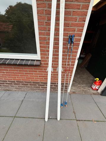 Langlaufski's + stokken - Zo goed als nieuw! beschikbaar voor biedingen