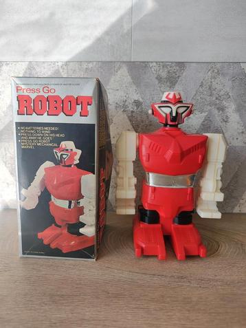 Vintage 1980s Hong Kong Press Go Robot met originele doos beschikbaar voor biedingen