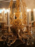 Grote bronze vergulde kroonluchter, Ophalen