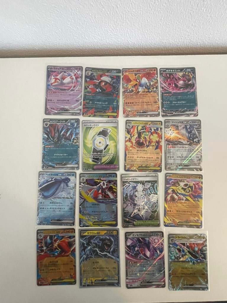 Japanse pokemon kaarten in hoesjes, Ophalen of Verzenden, Zo goed als nieuw, Meerdere kaarten