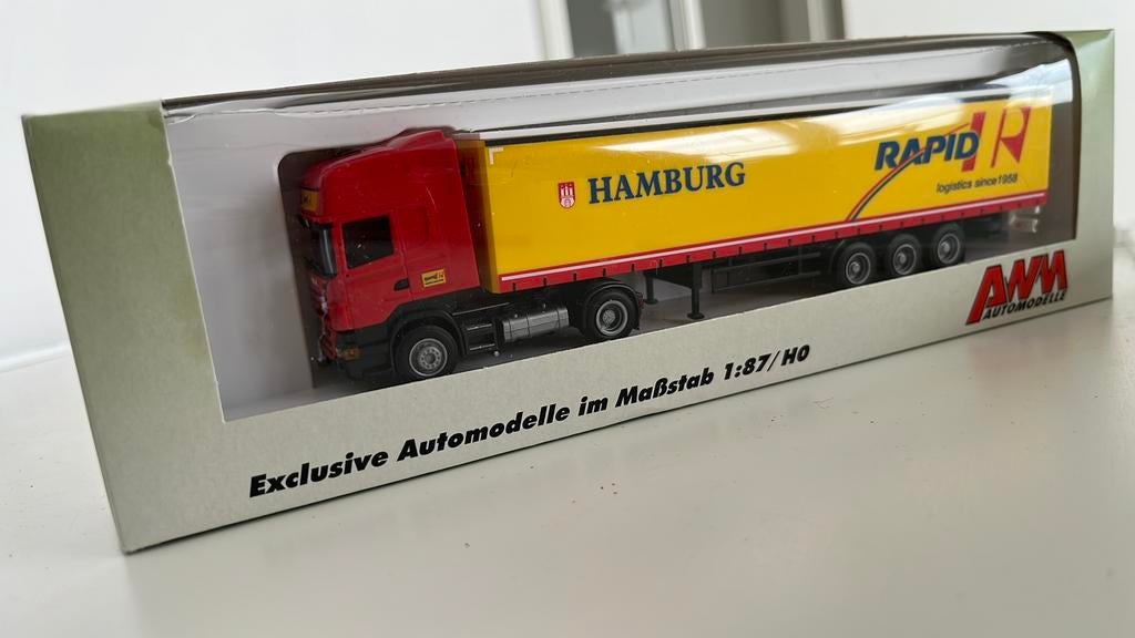 AWM Automodel Vrachtwagen Hamburg Rapid Logistics, Hobby en Vrije tijd, Modelauto's | 1:87, Nieuw, Bus of Vrachtwagen, AWM, Ophalen of Verzenden