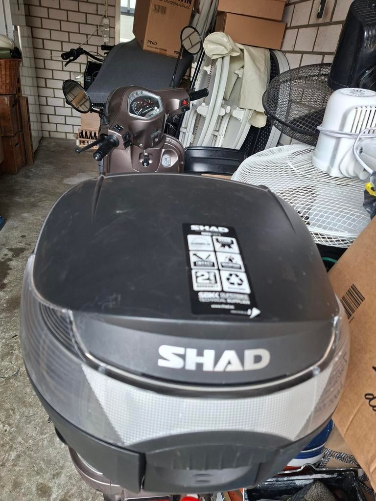 Te Koop Shad koffer, Ophalen