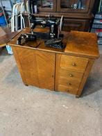 antieke naaimachine  Pfaff 130, Ophalen