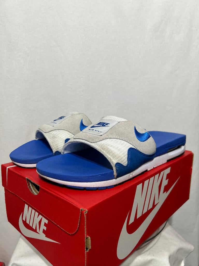 ALS NIEUW! Maat 49,5 - Nike Air Max 1 Slide Royal Blue, Kleding | Heren, Schoenen, Slippers, Nike, Zo goed als nieuw, Nike