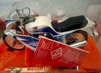 Suzuki Guiloy antiek speelgoed, Hobby en Vrije tijd, Modelauto's | 1:5 tot 1:12, Ophalen of Verzenden, Nieuw, Auto