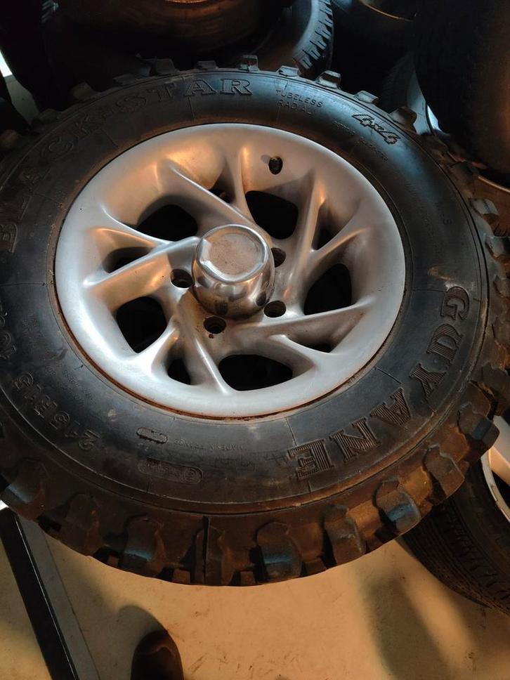 Suzuki Jimny velgen met terrein banden, Auto-onderdelen, Banden en Velgen, Zomerbanden, 15 inch, Ophalen