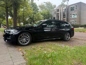 BMW 5-Serie 520i 184pk Aut. 2018 Zwart beschikbaar voor biedingen