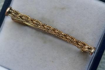 Antieke koord broche beschikbaar voor biedingen