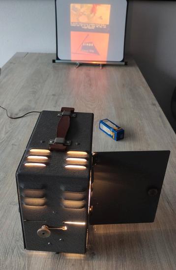 35mm FILMSTRIP ROLLETJES PROJECTOR  beschikbaar voor biedingen