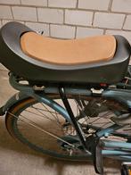 Urban iki achterzitje, Ophalen