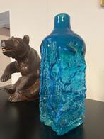 Medina glazen fles, Ophalen