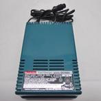 Nieuwe Makita snel lader model DC 1401, Ophalen of Verzenden, Nieuw