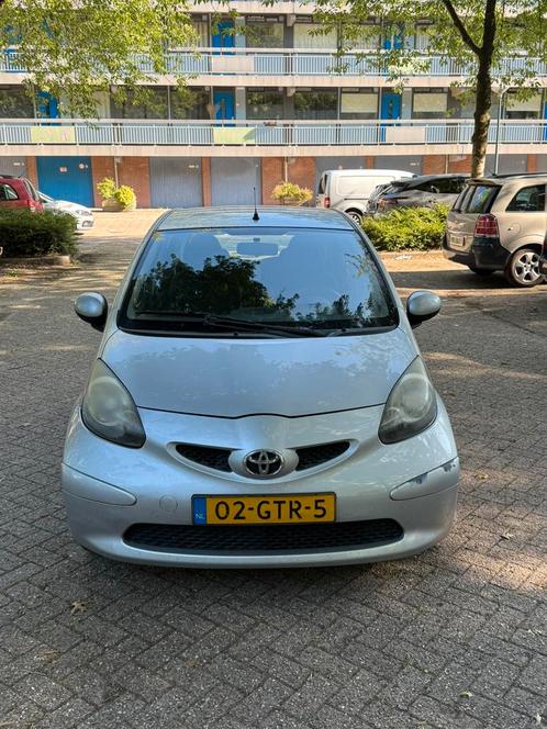 Toyota Aygo 1.0 12V Vvt-i 5DRS 2008 Grijs, Auto's, Toyota, Particulier, Aygo, Airconditioning, Centrale vergrendeling, Elektrische ramen