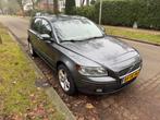 Volvo V50 1.6 D 2006 Grijs, Auto's, Voorwielaandrijving, 700 kg, Origineel Nederlands, Stationwagon