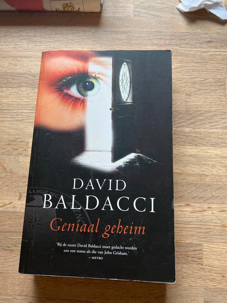 Geniaal Geheim - David Baldacci, Boeken, Thrillers, Gelezen, Nederland, Ophalen of Verzenden