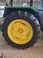 banden op John Deere velg, Ophalen