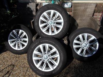 VW 2K5 601 025L VELGEN MET ALL SEASON BANDEN COLUNDRA CADDY beschikbaar voor biedingen
