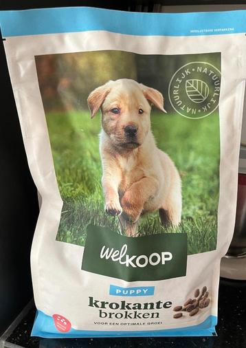 2x Puppy krokante brokken & maatbeker beschikbaar voor biedingen