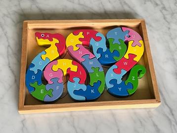 Houten slangen puzzel, alfabet en cijfers beschikbaar voor biedingen
