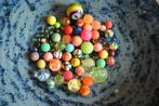 Partij stuiterballen en knikkers, Ophalen of Verzenden