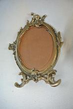 Ovale fotolijst met cherubijn, messing Hollywood Regency, Ophalen of Verzenden