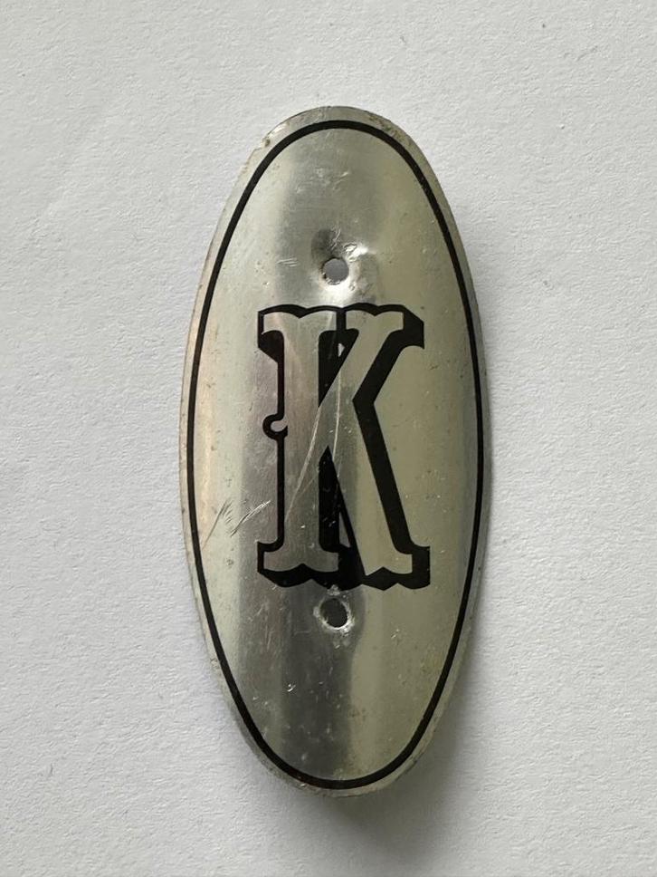 Balhoofdplaatje "K" Kopra rijwiel balhoofd plaatje., Verzamelen, Merken en Reclamevoorwerpen, Gebruikt, Overige typen, Ophalen of Verzenden