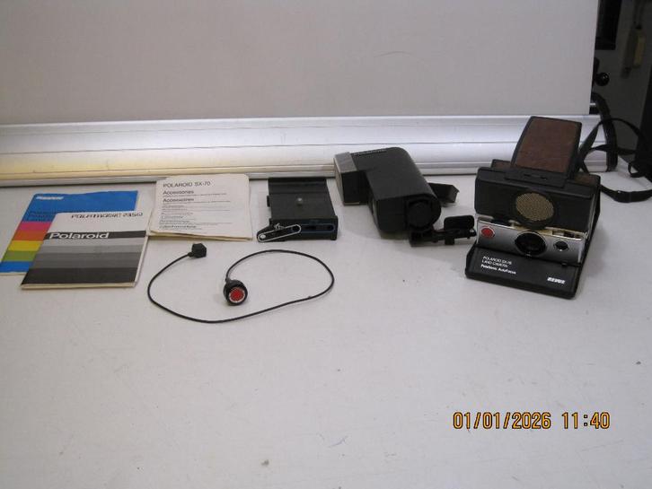 polaroid SX70 met assesoires in 1 koop werking ?? (368), Audio, Tv en Foto, Fotocamera's Analoog, Polaroid, Polaroid, Ophalen of Verzenden
