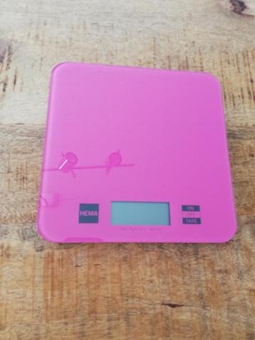Roze weegschaal beschikbaar voor biedingen