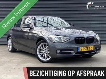 BMW 1-serie 114i Upgrade Edition / CARPLAY / LEER / KEURIG ! beschikbaar voor biedingen