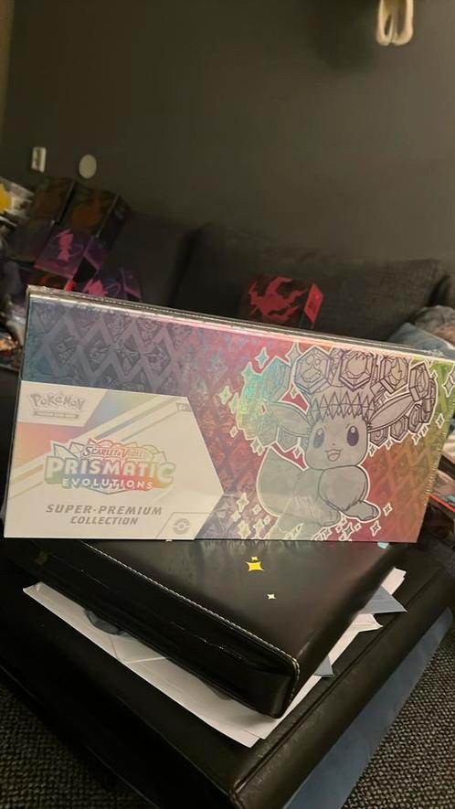 Prismatic Evolutions Super Premium Collection Box, Hobby en Vrije tijd, Verzamelkaartspellen | Pokémon, Zo goed als nieuw, Losse kaart