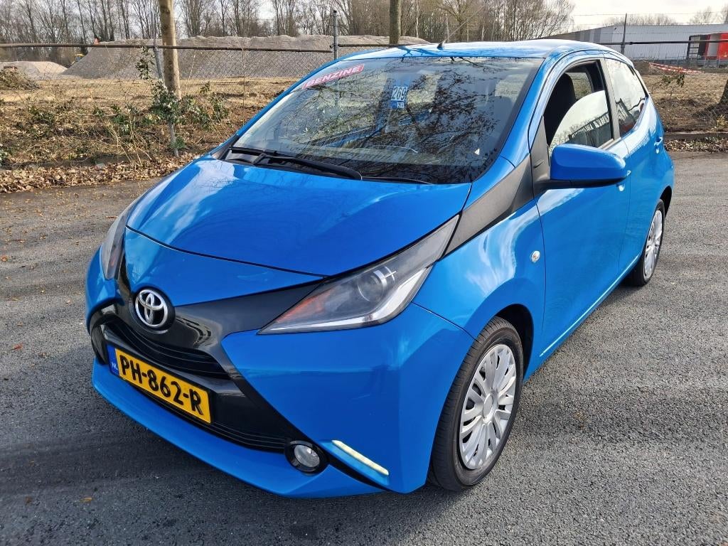 NEW MODEL Toyota Aygo 1.0 Vvt-i 69pk 5D 2017 Blauw, Auto's, Voorwielaandrijving, Stof, Origineel Nederlands, Bedrijf