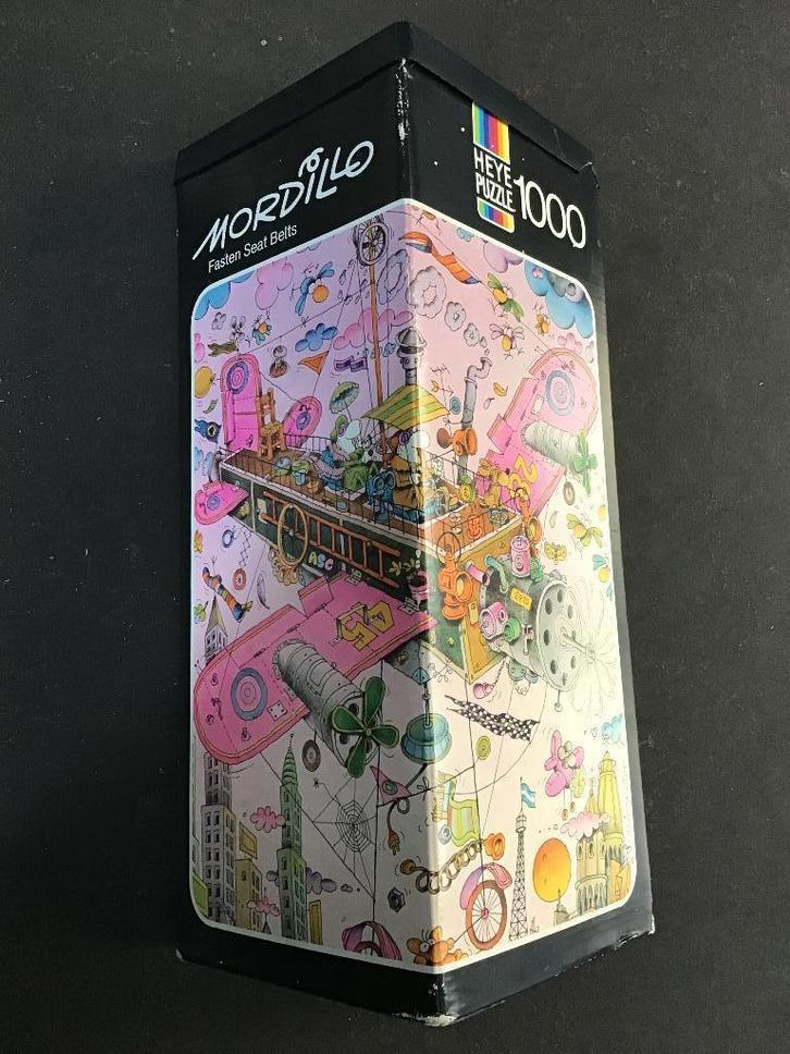 Heye Puzzel Mordillo Fasten Seat Belts 1000 stukjes, Hobby en Vrije tijd, Denksport en Puzzels, Gebruikt, Legpuzzel, 500 t/m 1500 stukjes