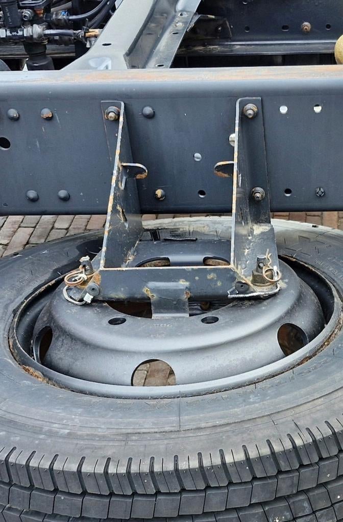 Reserve wiel steun, Ophalen